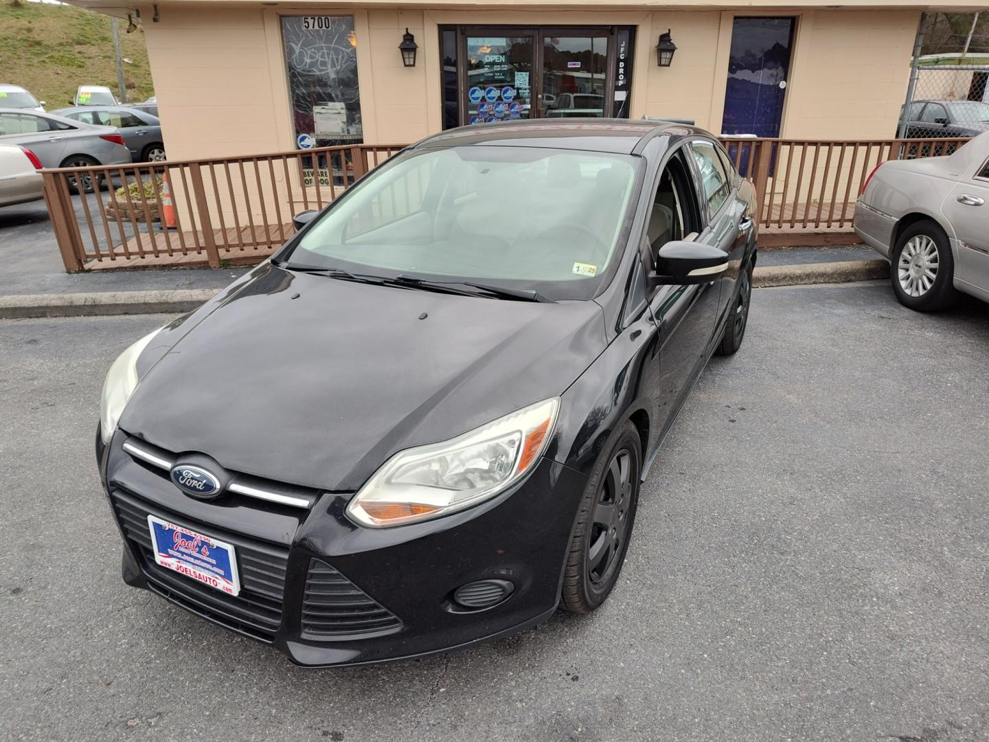 2014 Black Ford Focus (1FADP3F27EL) , Automatic transmission, located at 5700 Curlew Drive, Norfolk, VA, 23502, (757) 455-6330, 36.841885, -76.209412 - Photo#6